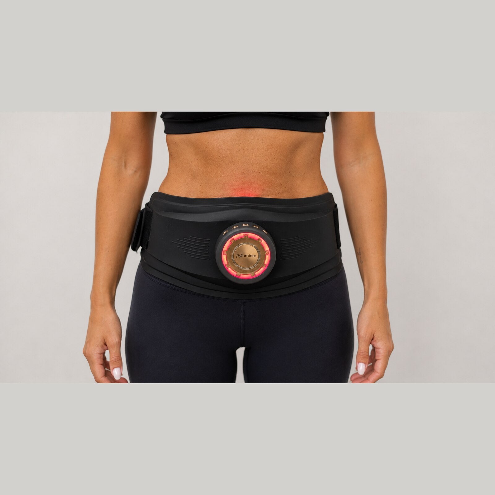 Close-up of Body Keeper X worn around the waist, with the gold center visible